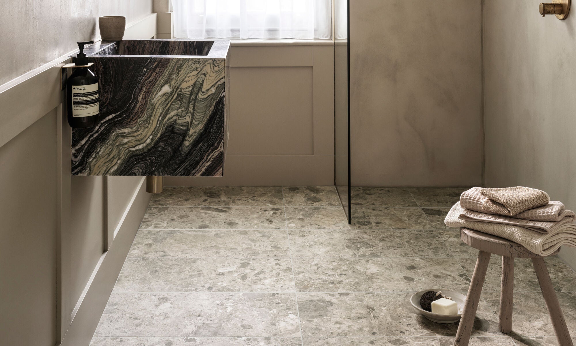 Comparing the different bathroom floor tile effects – Fired Earth