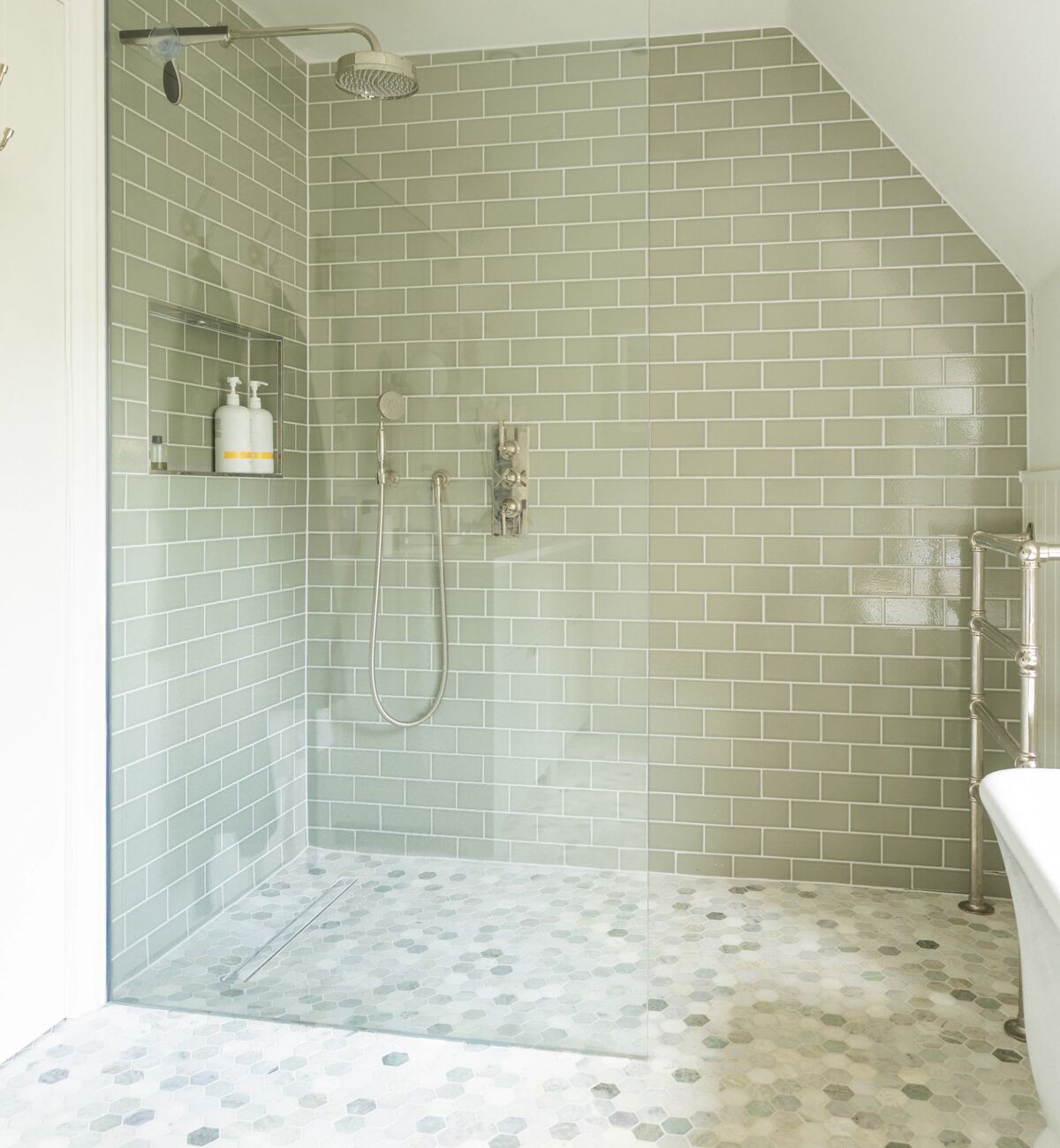 Small format mosaic tiles on a shower floor