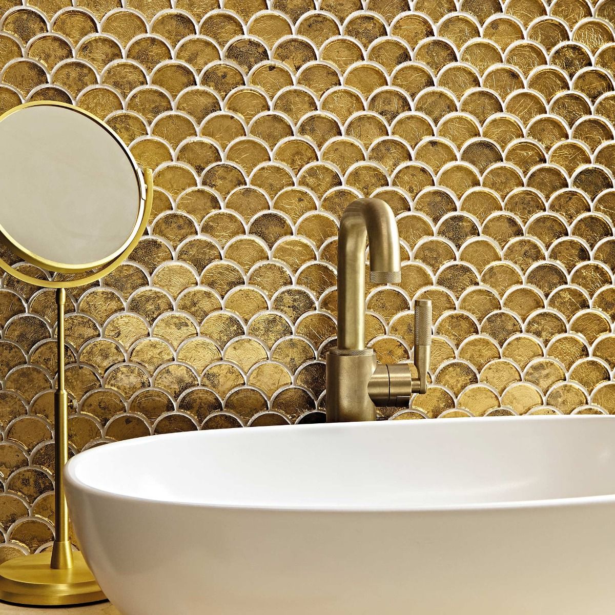 metallic scaled tiles behind a bath tub