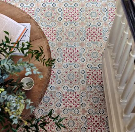 Seville Coral Aqua floor tile with table and plant